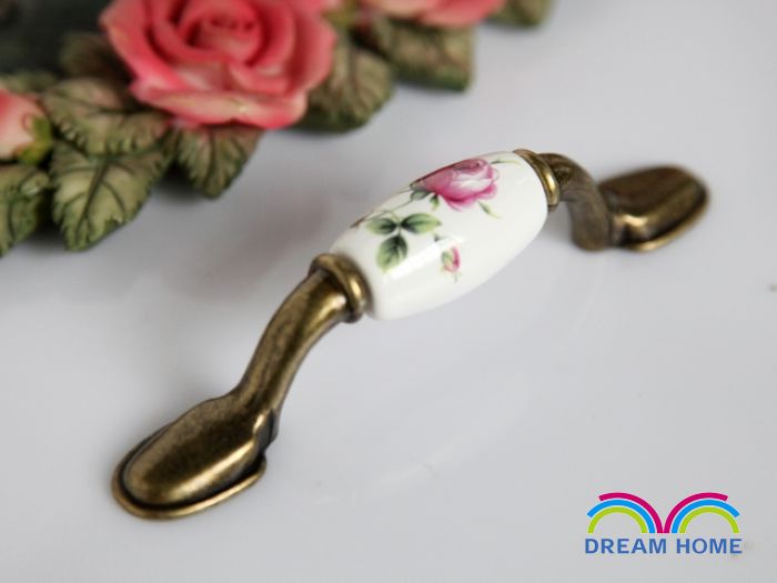 AB07AB 76mm hole distance long and flat ceramic handle with a budding flower for drawer/cupboard
