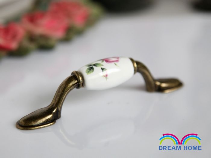 AB07AB 76mm hole distance long and flat ceramic handle with a budding flower for drawer/cupboard